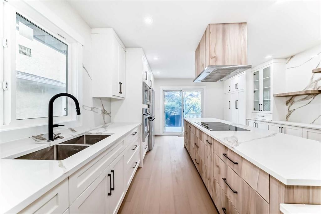 64 Woodstock Road Sw, Calgary, AB - Indoor Photo Showing Kitchen With Double Sink With Upgraded Kitchen