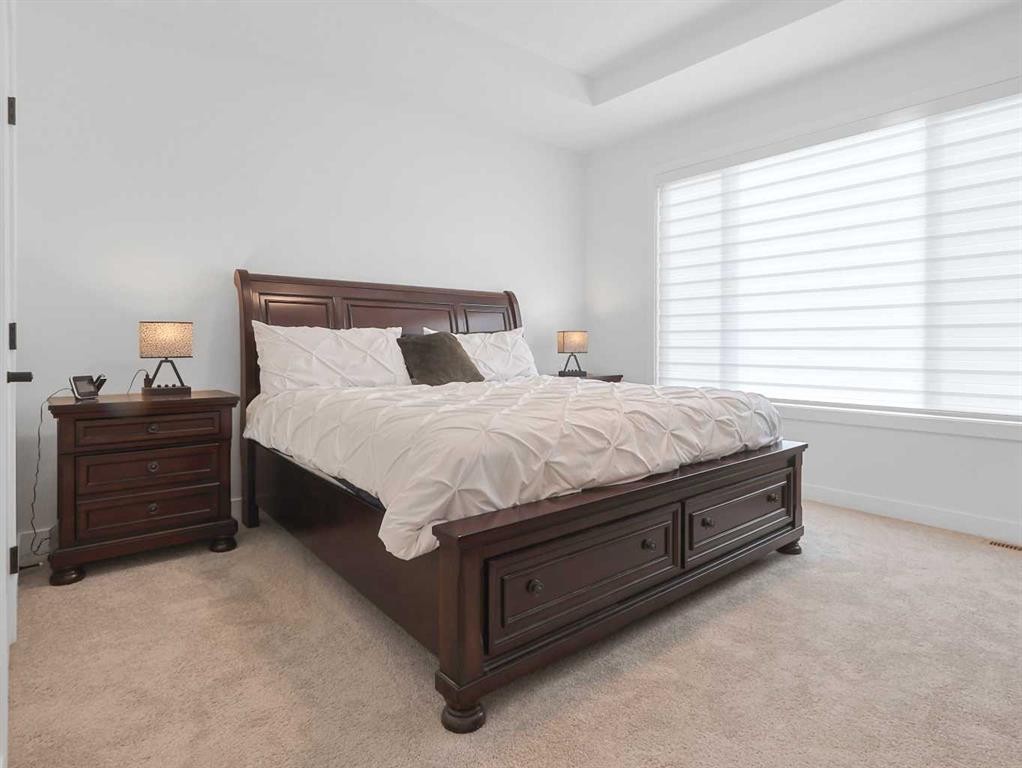 110 Sunstone Way, Balzac, AB - Indoor Photo Showing Bedroom