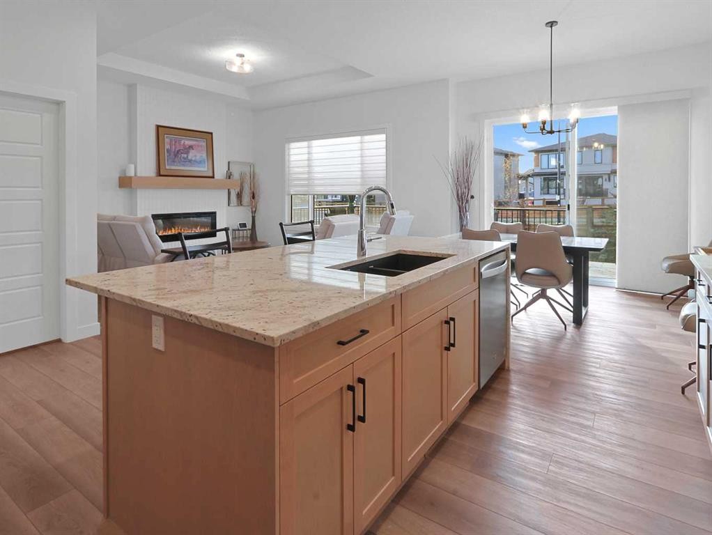 110 Sunstone Way, Balzac, AB - Indoor Photo Showing Kitchen With Double Sink