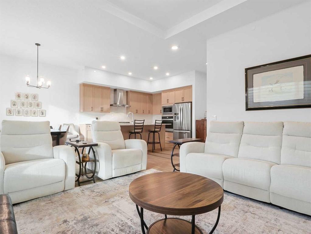 110 Sunstone Way, Balzac, AB - Indoor Photo Showing Living Room