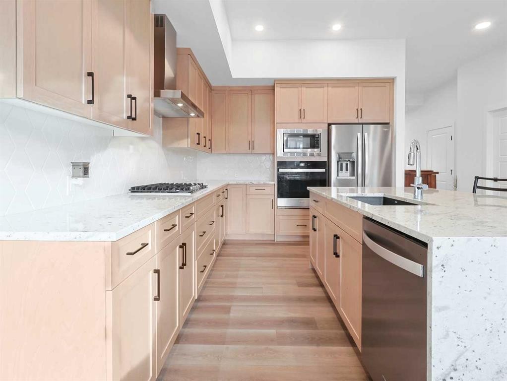 110 Sunstone Way, Balzac, AB - Indoor Photo Showing Kitchen With Upgraded Kitchen