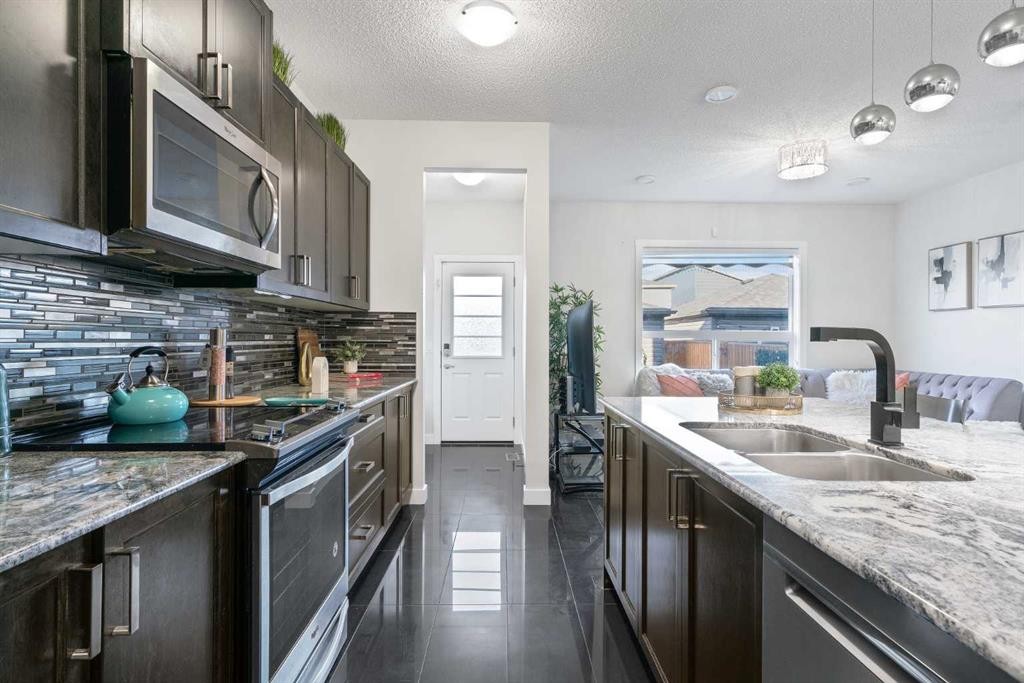 40 Cornerstone Avenue Ne, Calgary, AB - Indoor Photo Showing Kitchen With Double Sink With Upgraded Kitchen