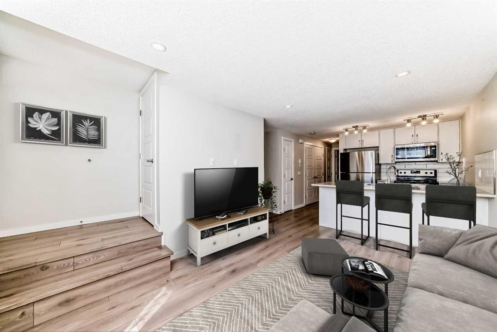109 Cranbrook Square Se, Calgary, AB - Indoor Photo Showing Living Room