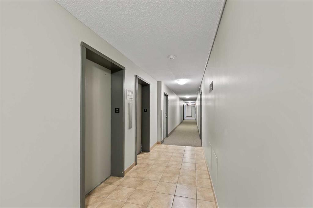 207-1335 12 Avenue Sw, Calgary, AB - Indoor Photo Showing Other Room
