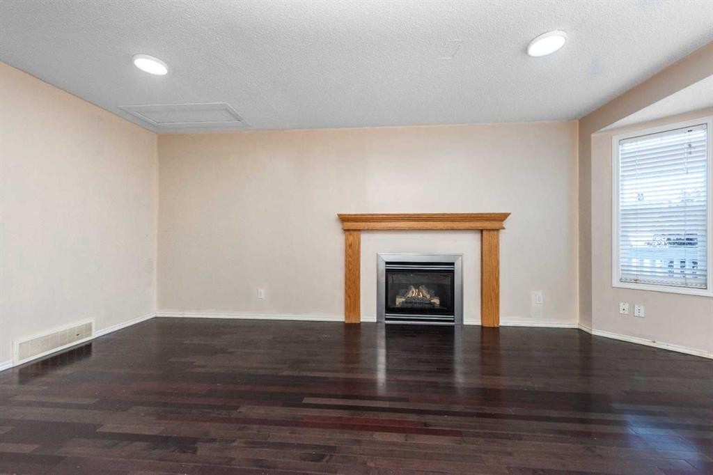 171 Tarawood Road Ne, Calgary, AB - Indoor With Fireplace