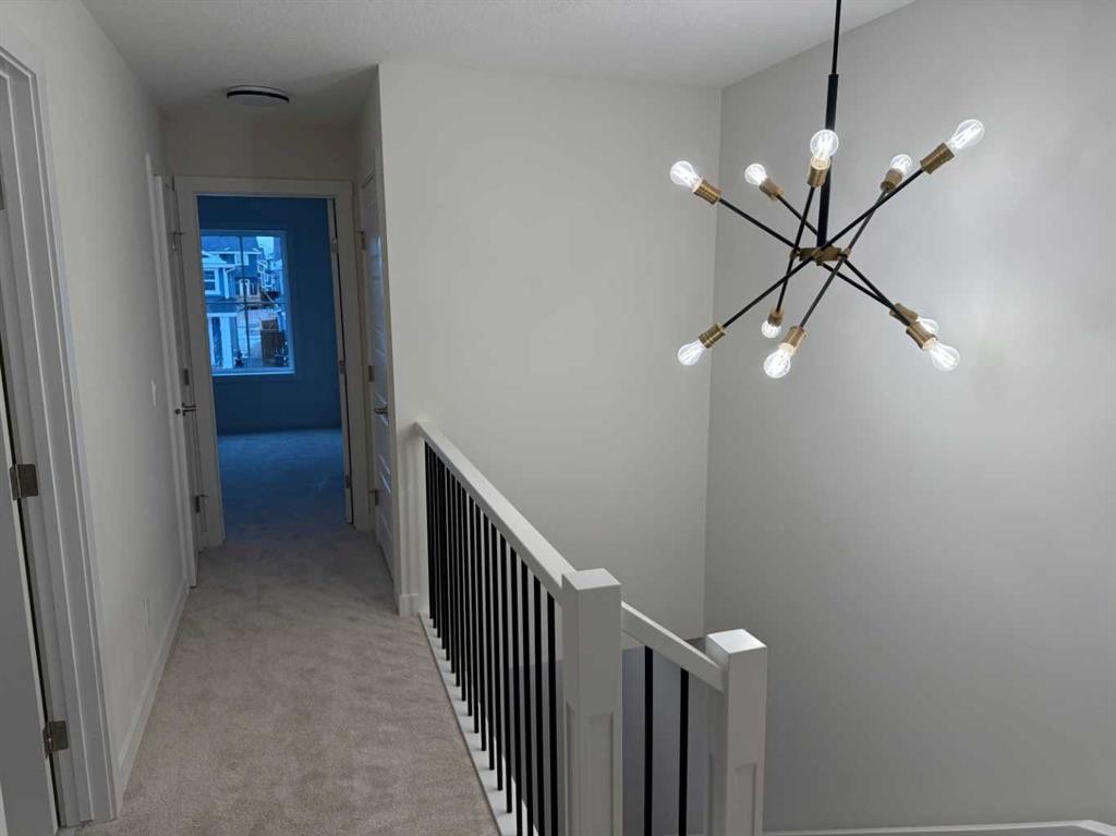 334 Sundown Road, Cochrane, AB - Indoor Photo Showing Other Room