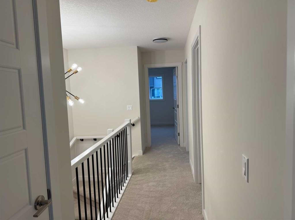 334 Sundown Road, Cochrane, AB - Indoor Photo Showing Other Room