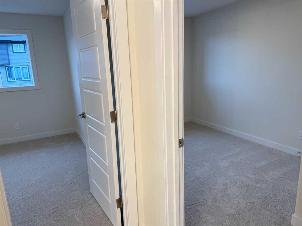 334 Sundown Road, Cochrane, AB - Indoor Photo Showing Other Room