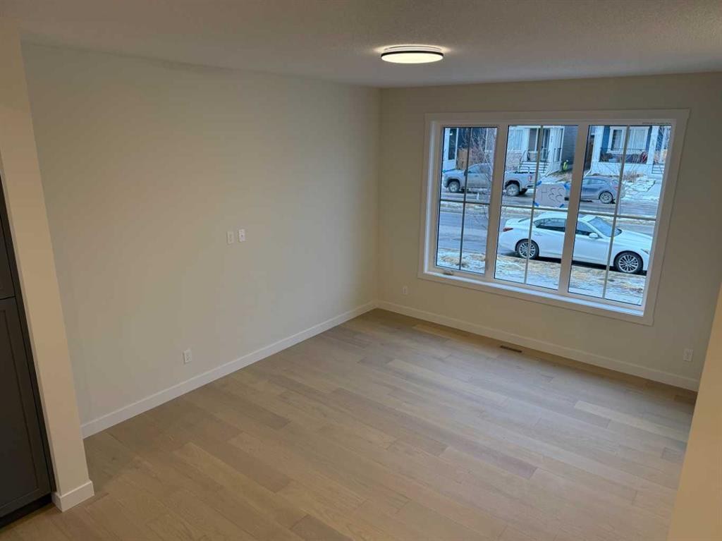 334 Sundown Road, Cochrane, AB - Indoor Photo Showing Other Room