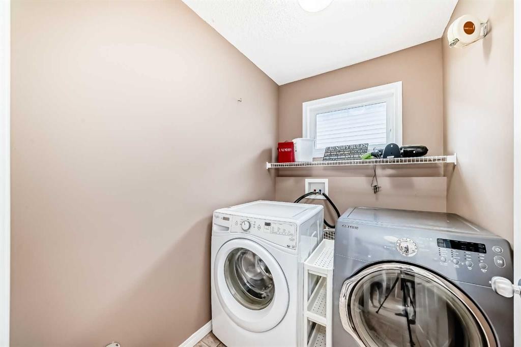 423 Morningside Way Sw, Airdrie, AB - Indoor Photo Showing Laundry Room