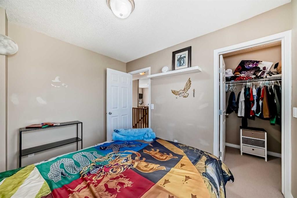 423 Morningside Way Sw, Airdrie, AB - Indoor Photo Showing Bedroom