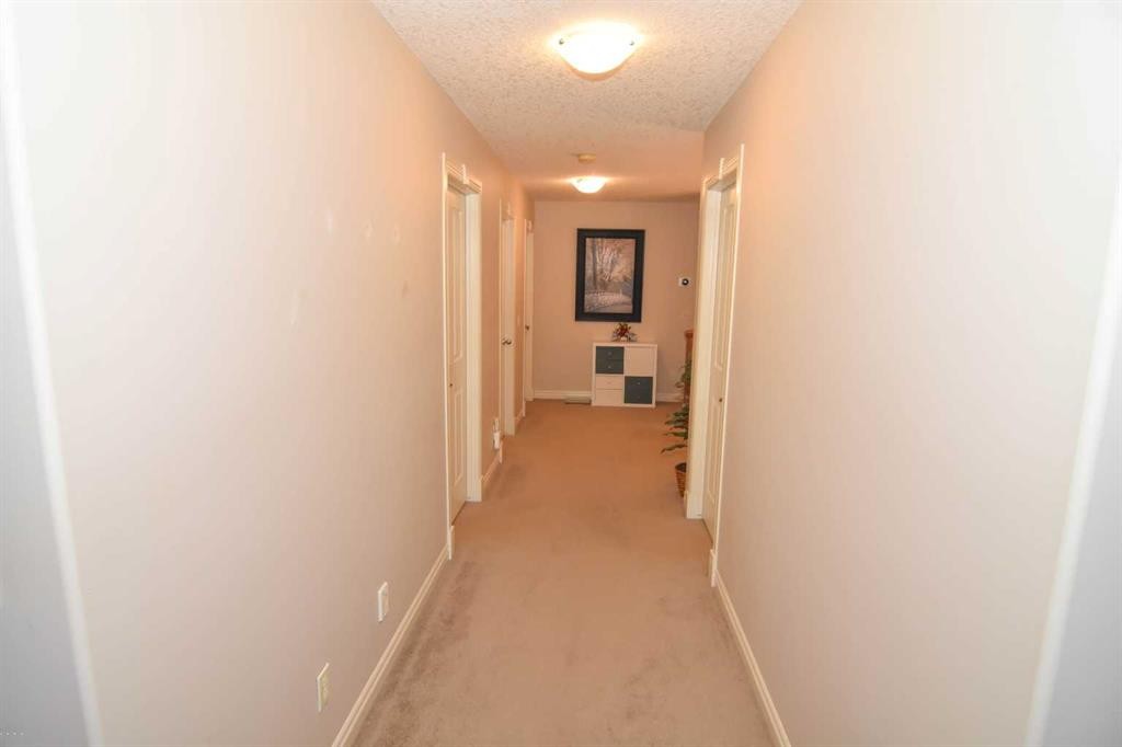 107 Panatella Close Nw, Calgary, AB - Indoor Photo Showing Other Room