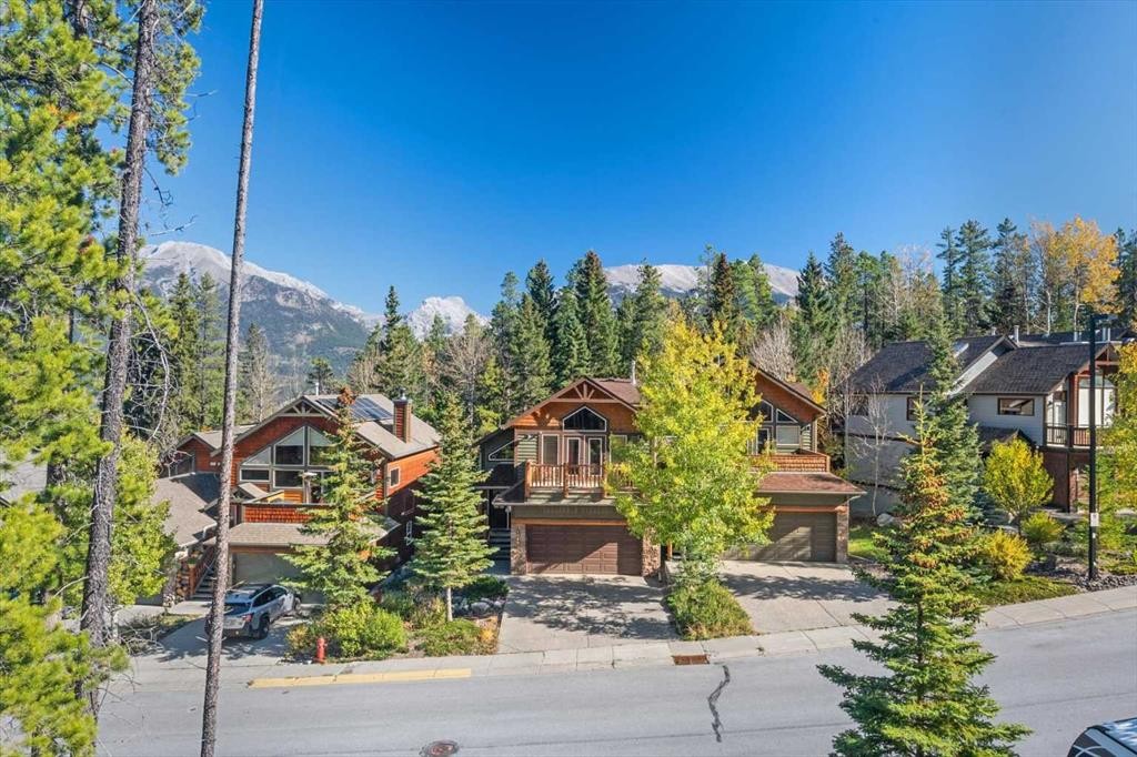 1073 Wilson Way, Canmore, AB - Outdoor With Facade
