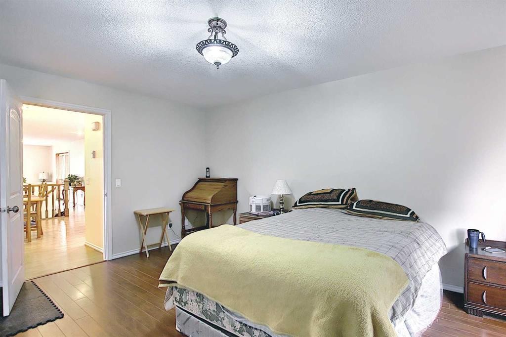 255046 Township Road 250, Rural Wheatland County, AB - Indoor Photo Showing Bedroom