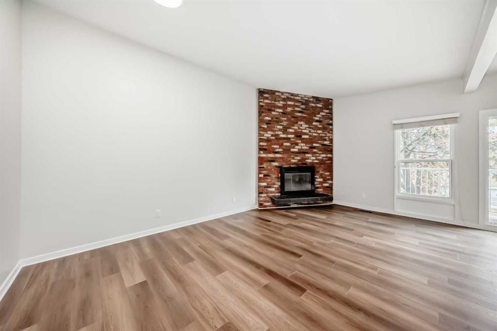 6525 58 Street Nw, Calgary, AB - Indoor Photo Showing Living Room With Fireplace