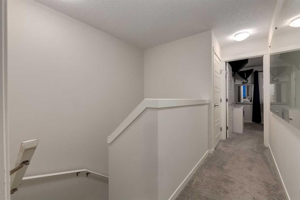 605-474 Seton Circle Se, Calgary, AB - Indoor Photo Showing Other Room