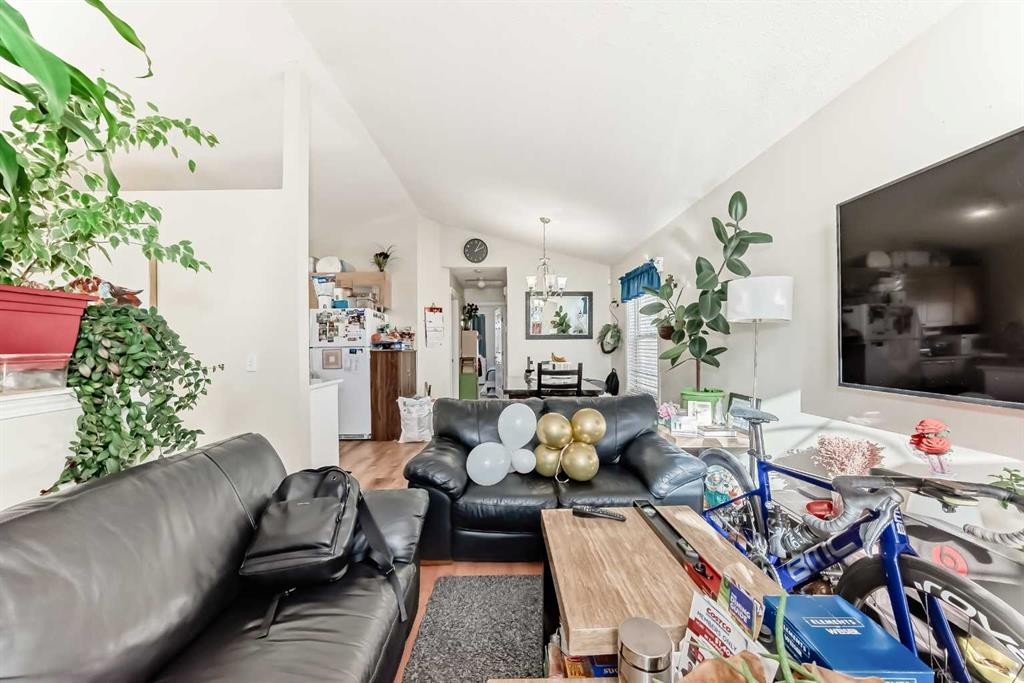 144 Taradale Drive Ne, Calgary, AB - Indoor Photo Showing Living Room