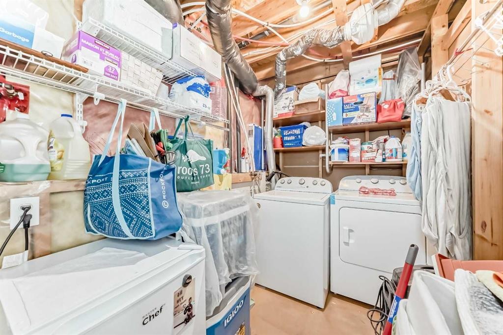 144 Taradale Drive Ne, Calgary, AB - Indoor Photo Showing Laundry Room
