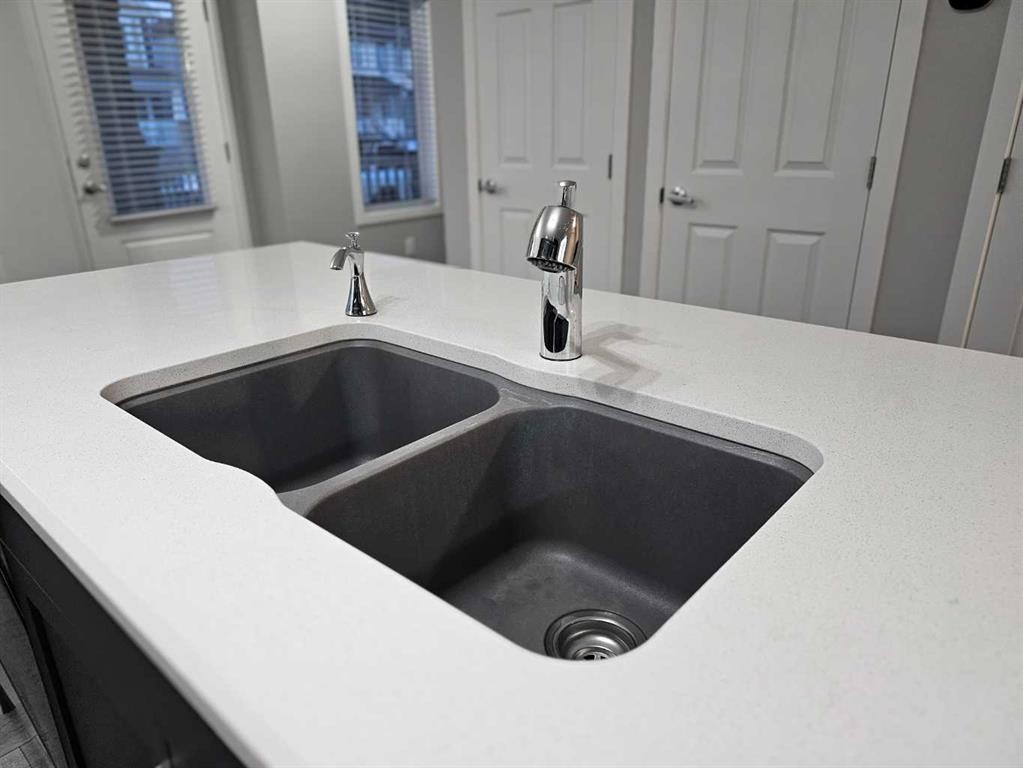 1485 148 Avenue Nw, Calgary, AB - Indoor Photo Showing Kitchen With Double Sink