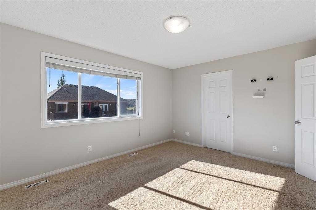 724 Windridge Road Sw, Airdrie, AB - Indoor Photo Showing Other Room