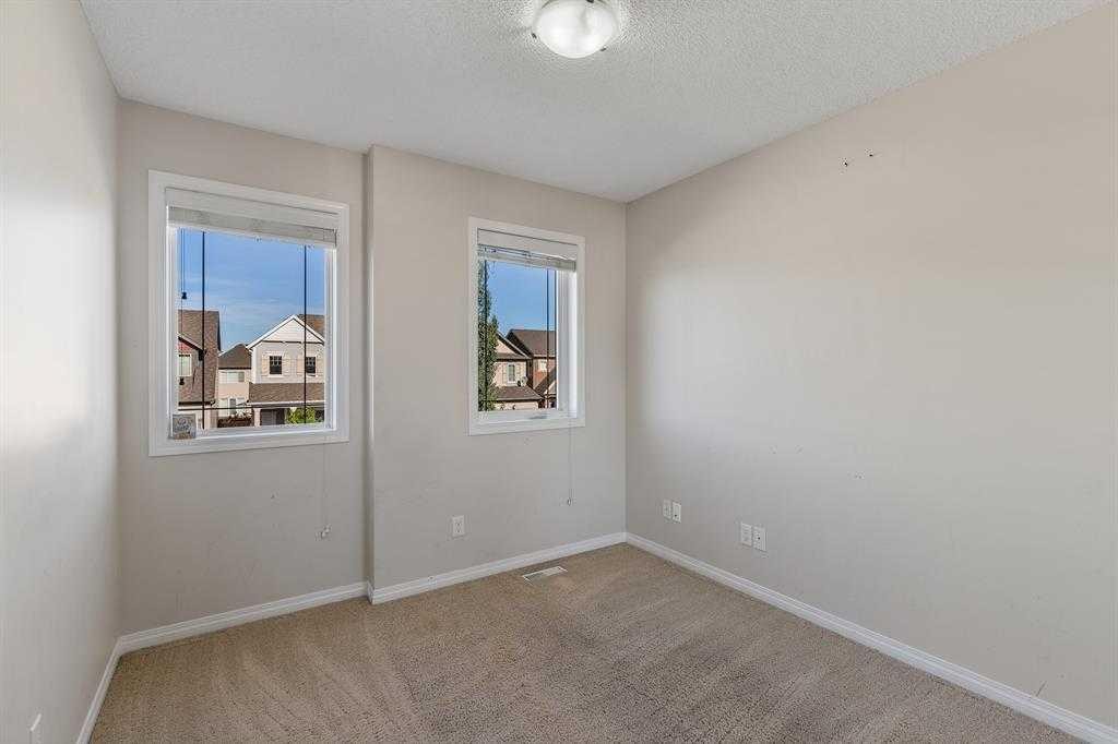 724 Windridge Road Sw, Airdrie, AB - Indoor Photo Showing Other Room