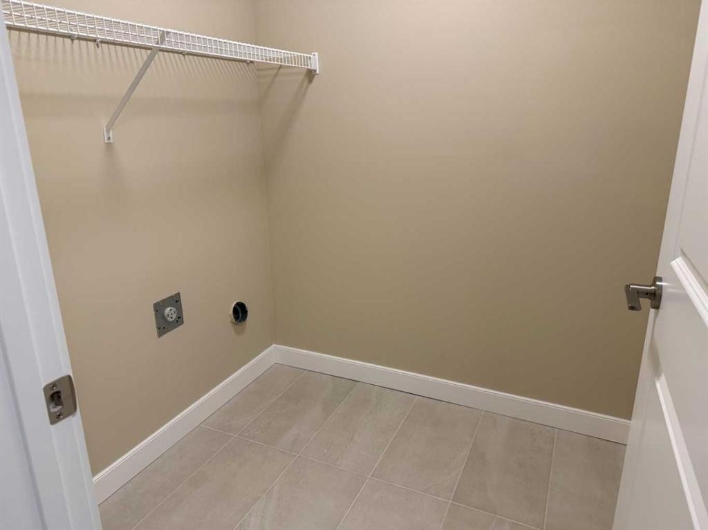 72 Sunrise Heath, Cochrane, AB - Indoor With Storage