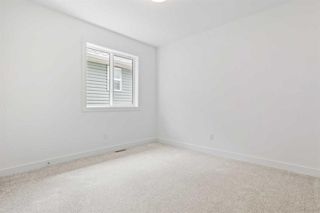 357 Copperhead Way Se, Calgary, AB - Indoor Photo Showing Other Room