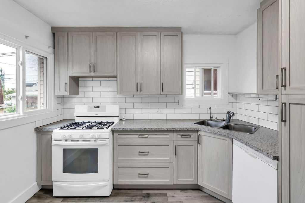 1212 Bantry Street Ne, Calgary, AB - Indoor Photo Showing Kitchen With Double Sink