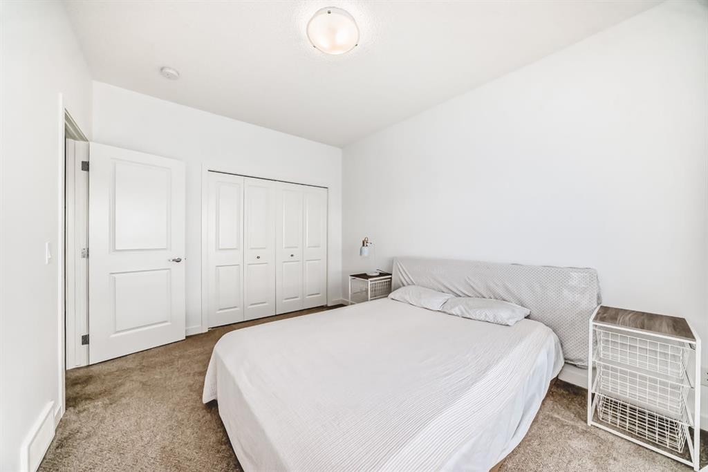 802-250 Fireside View, Cochrane, AB - Indoor Photo Showing Bedroom