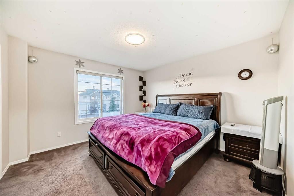 50 Tarawood Lane Ne, Calgary, AB - Indoor Photo Showing Bedroom