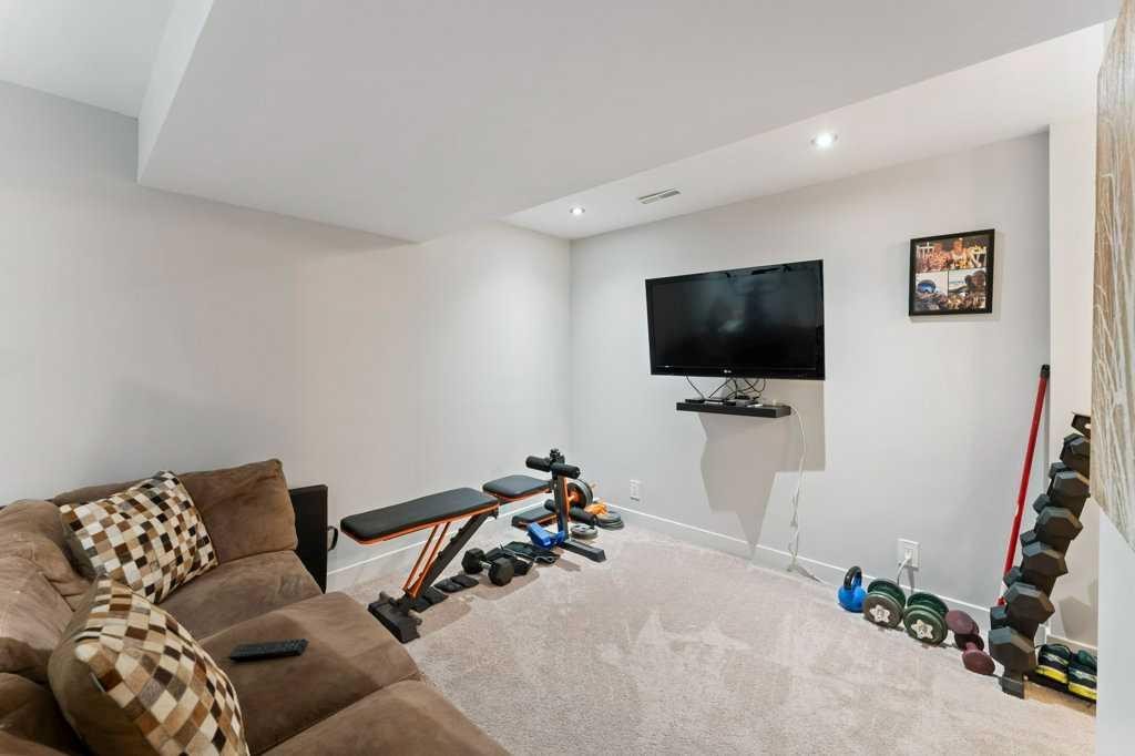 4640 81 Street Nw, Calgary, AB - Indoor Photo Showing Gym Room