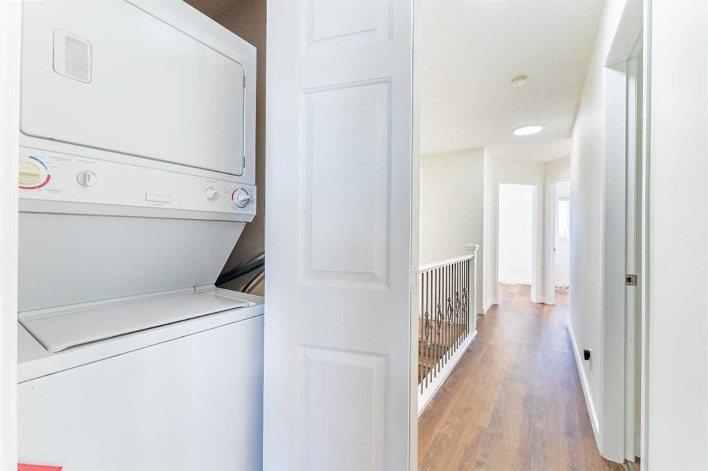 121 Eversyde Point Sw, Calgary, AB - Indoor Photo Showing Laundry Room