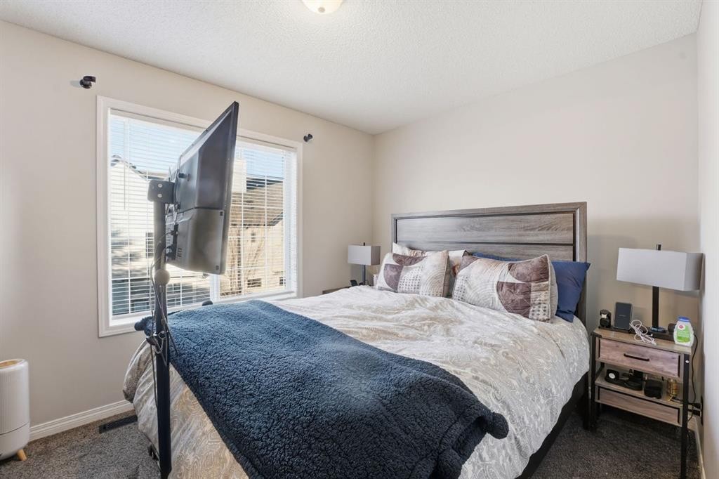 168 Copperfield Court Se, Calgary, AB - Indoor Photo Showing Bedroom