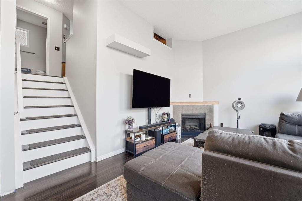 168 Copperfield Court Se, Calgary, AB - Indoor With Fireplace