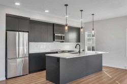 201-360 Harvest Hills Way NE Calgary, AB T3K 4K4