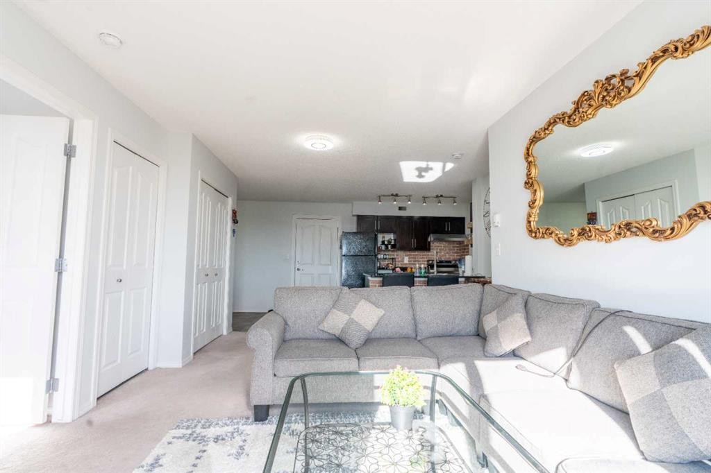 425-355 Taralake Way Ne, Calgary, AB - Indoor Photo Showing Living Room