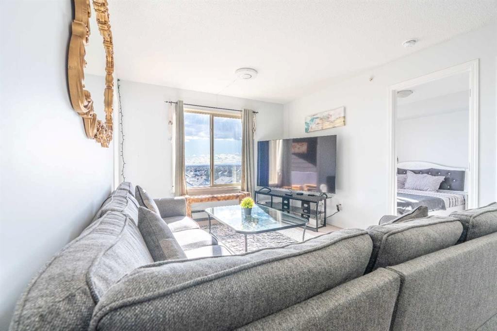 425-355 Taralake Way Ne, Calgary, AB - Indoor Photo Showing Living Room