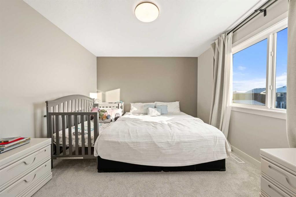 281 Waterford Boulevard, Chestermere, AB - Indoor Photo Showing Bedroom