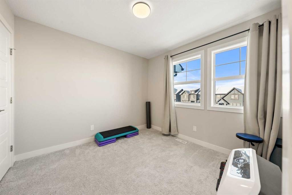 281 Waterford Boulevard, Chestermere, AB - Indoor Photo Showing Other Room