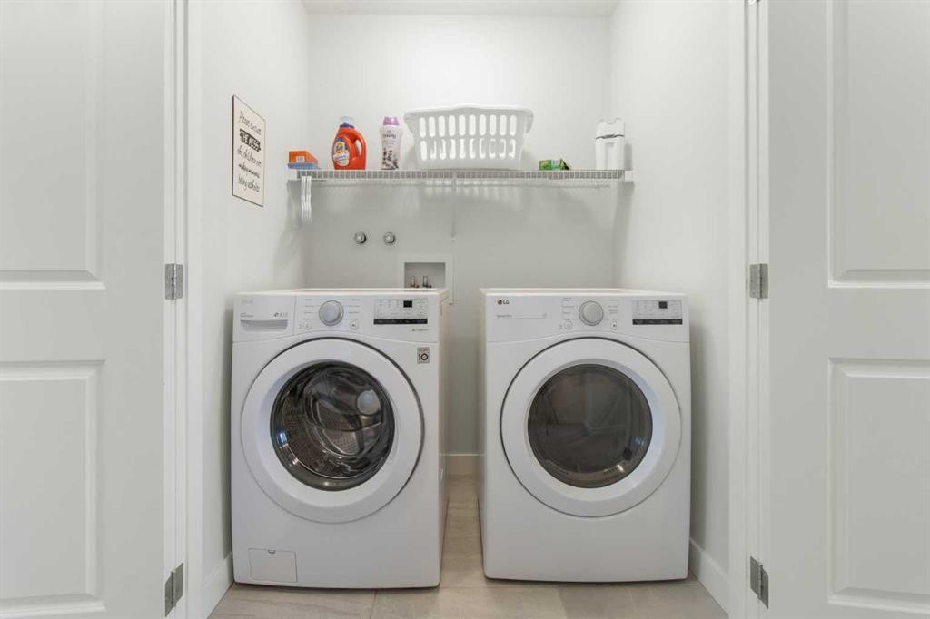 112 Fireside Crescent, Cochrane, AB - Indoor Photo Showing Laundry Room