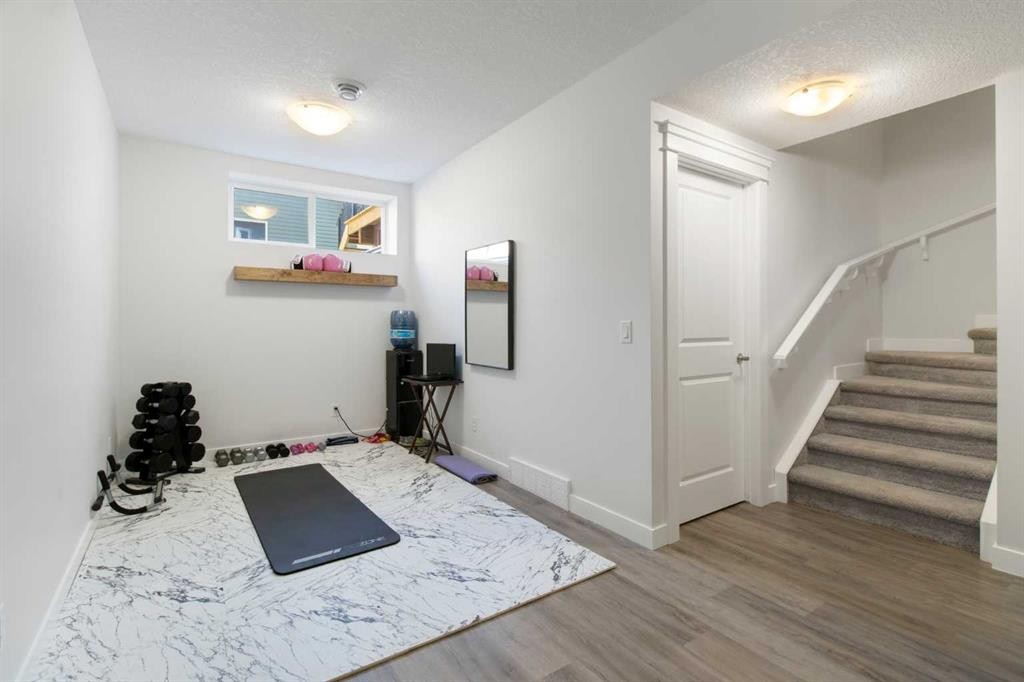 112 Fireside Crescent, Cochrane, AB - Indoor Photo Showing Other Room