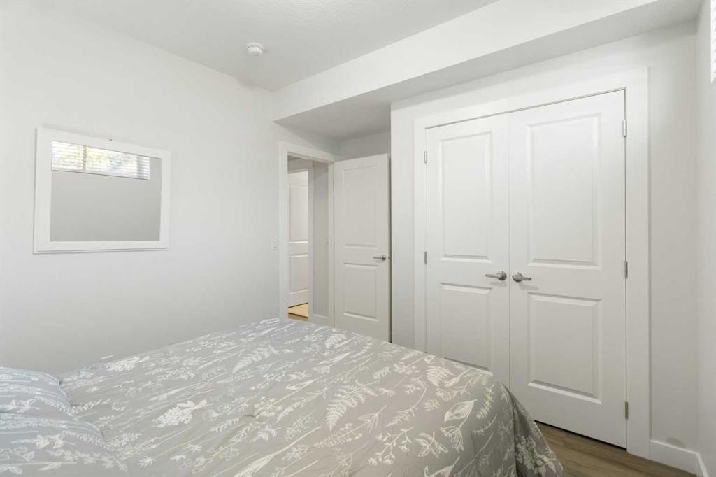 112 Fireside Crescent, Cochrane, AB - Indoor Photo Showing Bedroom
