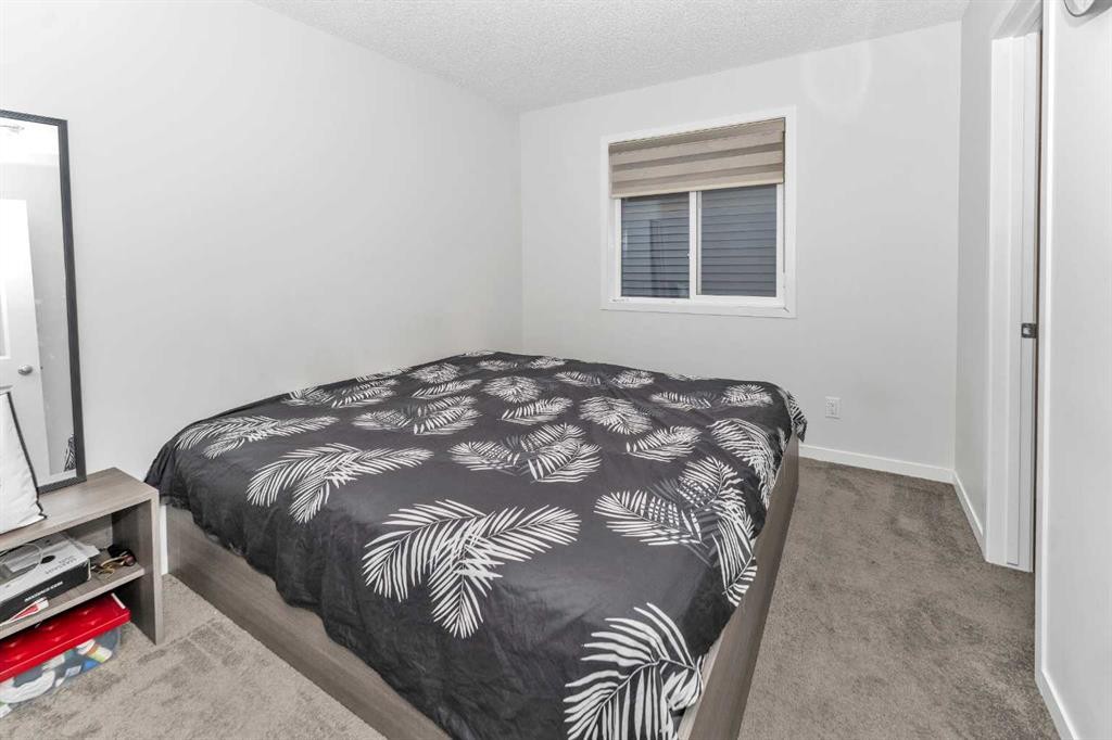 1174 Cornerstone Boulevard Ne, Calgary, AB - Indoor Photo Showing Bedroom