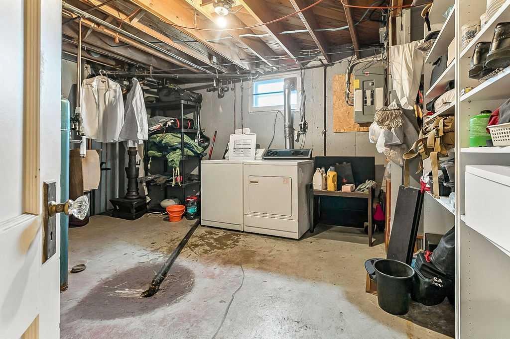 2731 Morley Trail Nw, Calgary, AB - Indoor Photo Showing Laundry Room
