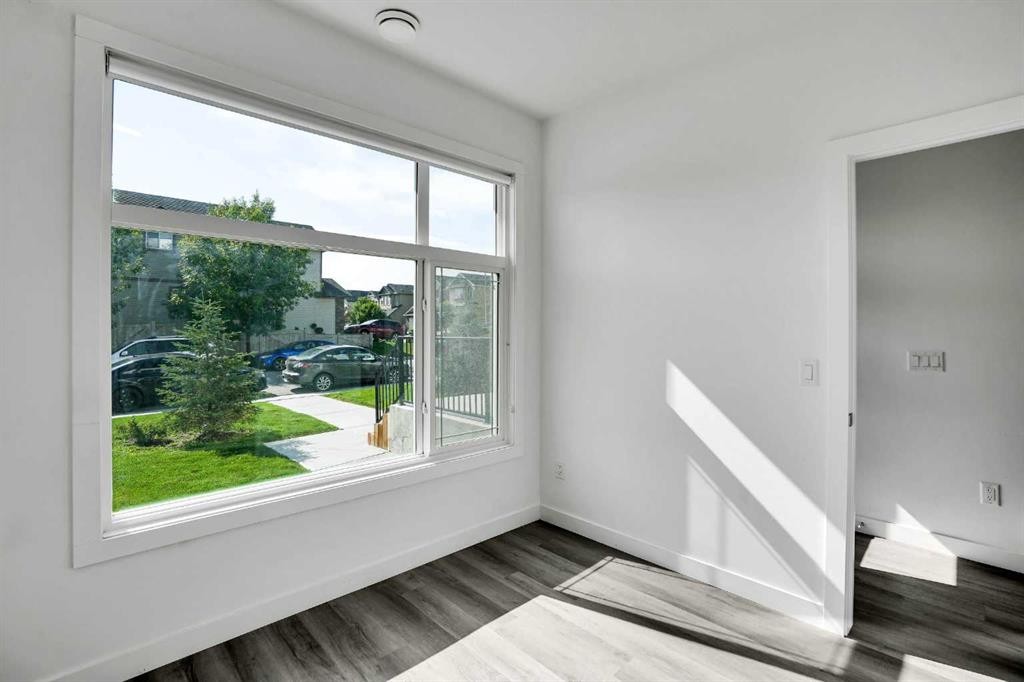 105 Panatella Square Nw, Calgary, AB - Indoor Photo Showing Other Room