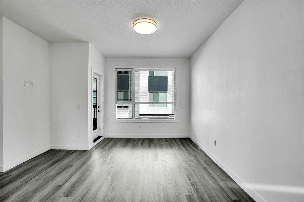 105 Panatella Square Nw, Calgary, AB - Indoor Photo Showing Other Room