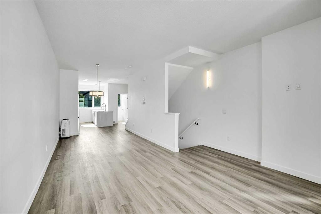 105 Panatella Square Nw, Calgary, AB - Indoor Photo Showing Other Room