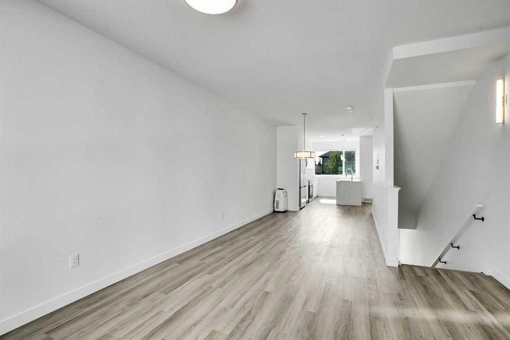 105 Panatella Square Nw, Calgary, AB - Indoor Photo Showing Other Room