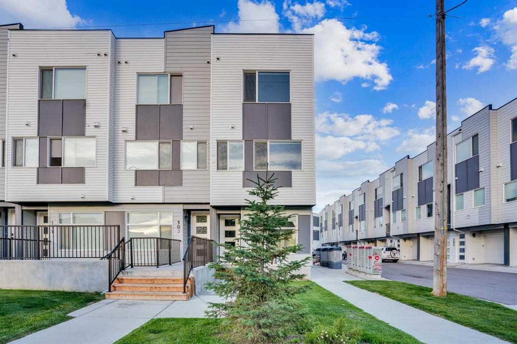 105 Panatella Square Nw, Calgary, AB - Outdoor With Facade