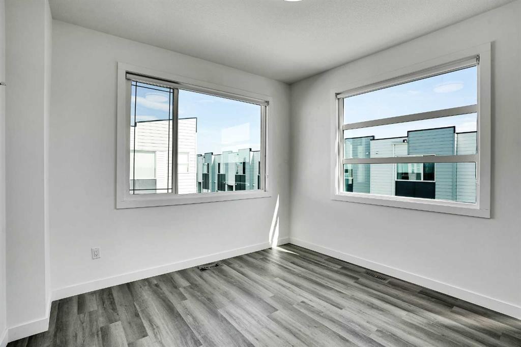 105 Panatella Square Nw, Calgary, AB - Indoor Photo Showing Other Room